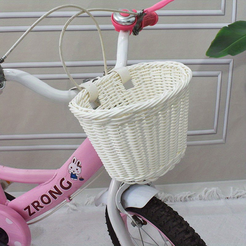 Rosa Fahrradkorb aus Kunststoff mit geflochtenem Lenkergriff für Kinder