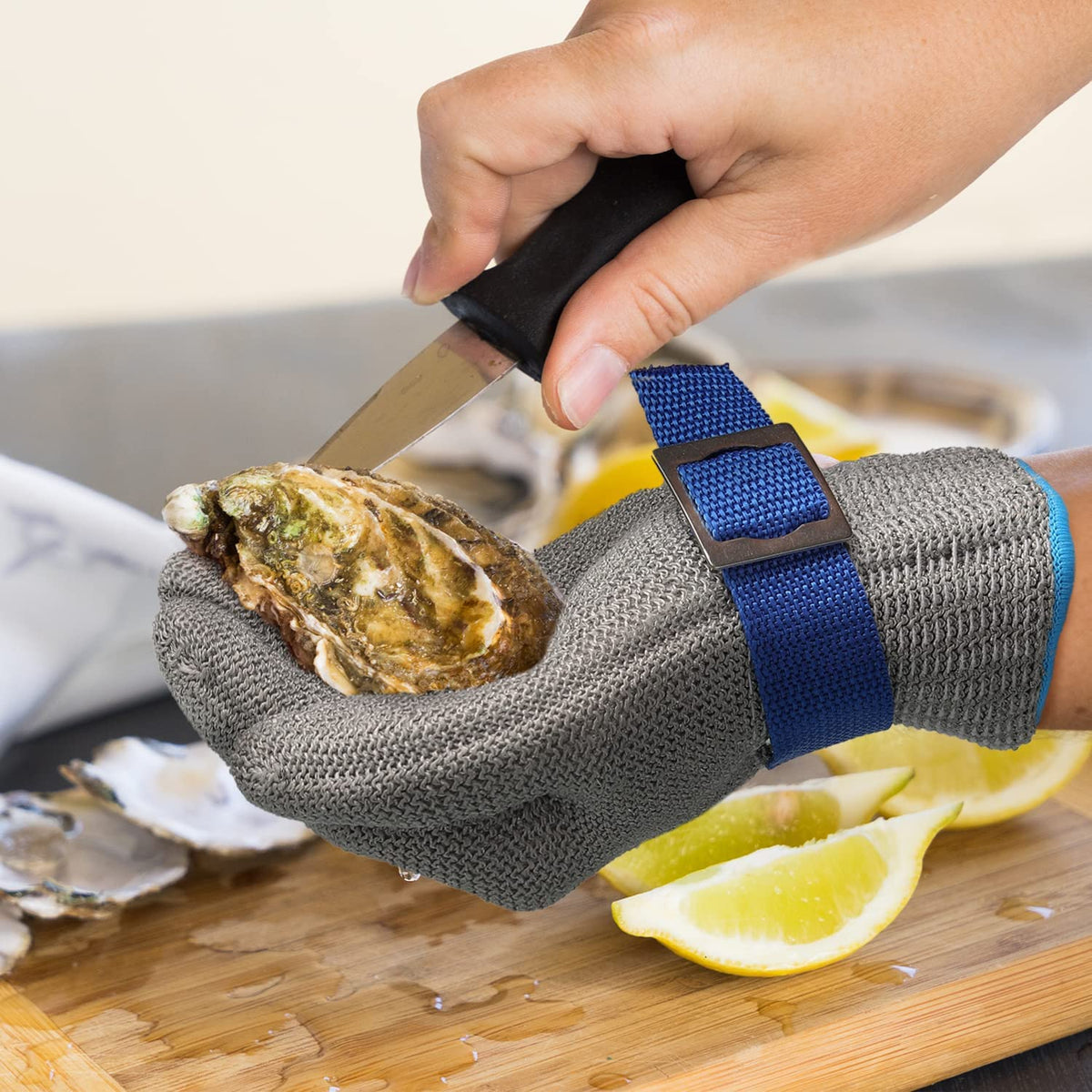 Gant en maille d’acier inoxydable résistant aux coupures, conforme ANSI A9 et adapté au contact alimentaire