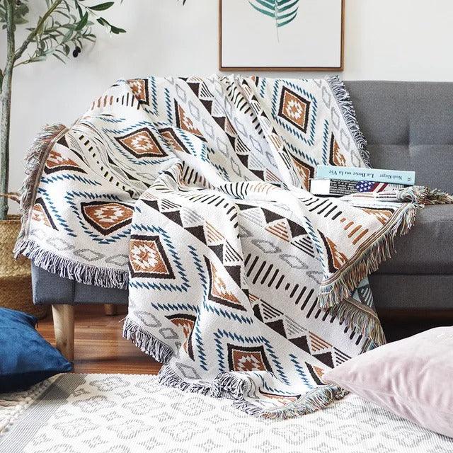 Värikäs jacquard-torkkupeitto — pehmeää puuvilla-polyesteriä, hapsut
