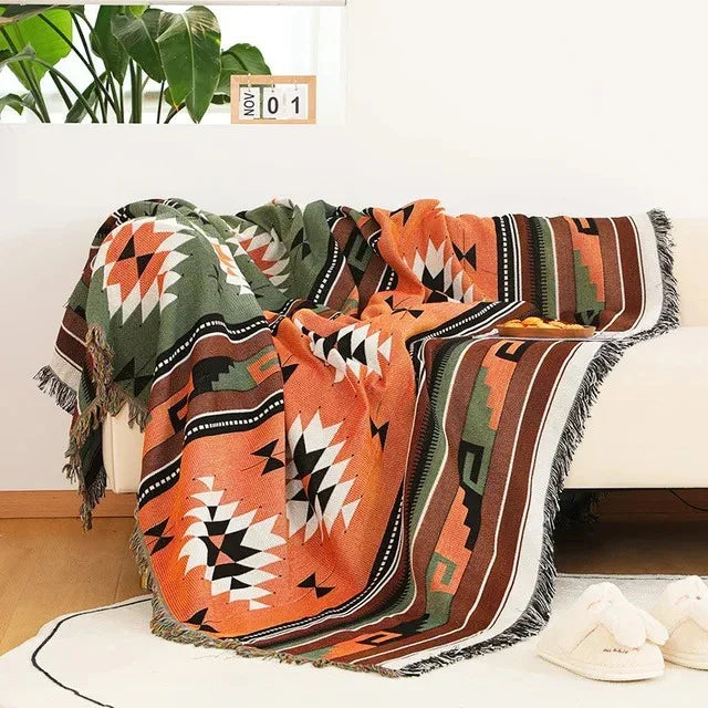 Värikäs jacquard-torkkupeitto — pehmeää puuvilla-polyesteriä, hapsut