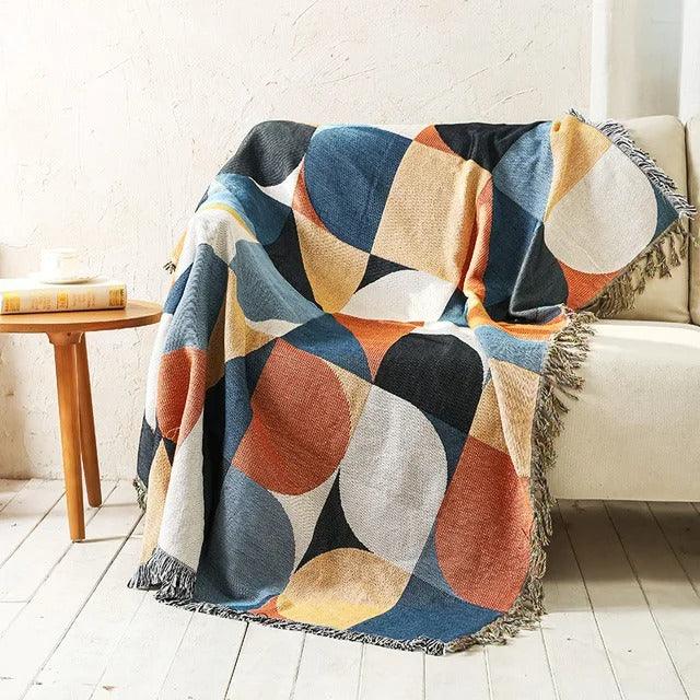 Värikäs jacquard-torkkupeitto — pehmeää puuvilla-polyesteriä, hapsut