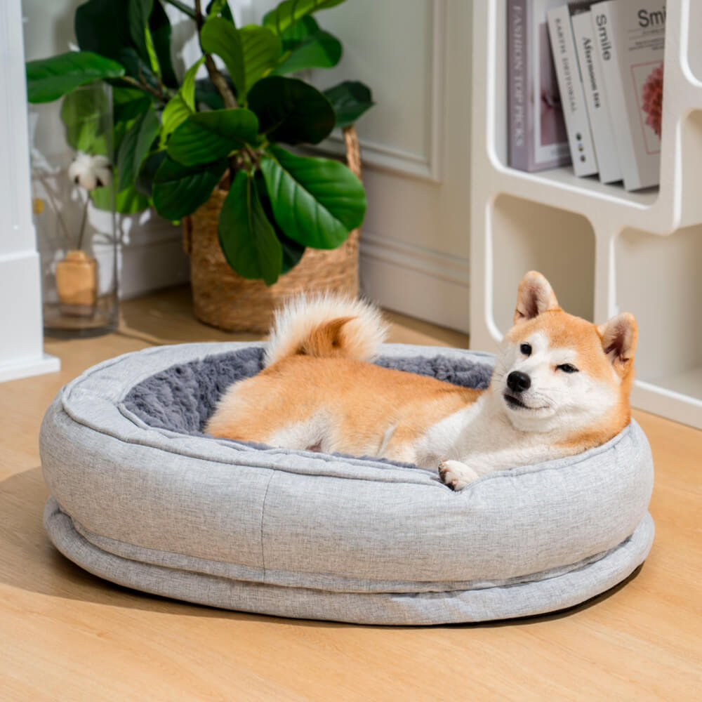Cama donut para perros — espuma ortopédica, borde alto, antideslizante