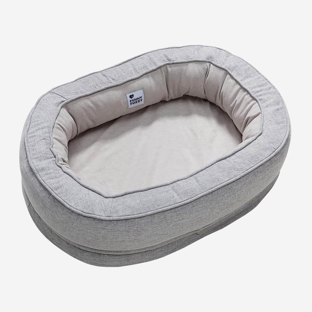 Cama donut para perros — espuma ortopédica, borde alto, antideslizante