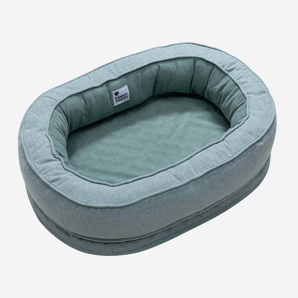 Cama donut para perros — espuma ortopédica, borde alto, antideslizante
