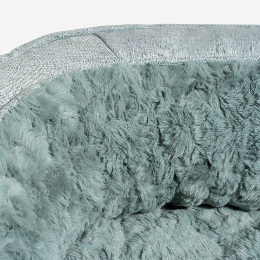 Cama donut para perros — espuma ortopédica, borde alto, antideslizante