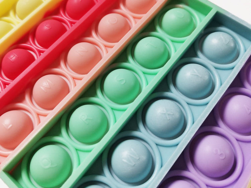 CalmWave Anti-Stress Ball — Pocket-Sized Push Pop Bubble Fidget, Rainbow