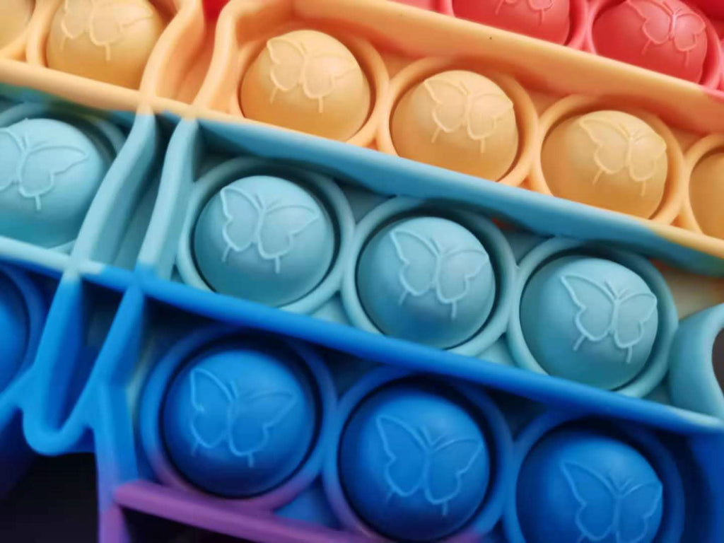 CalmWave Anti-Stress Ball — Pocket-Sized Push Pop Bubble Fidget, Rainbow
