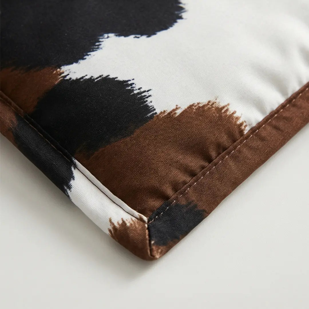 Påslakanset med koskinnsmönster, brun/svart/vit, polyester 90gsm