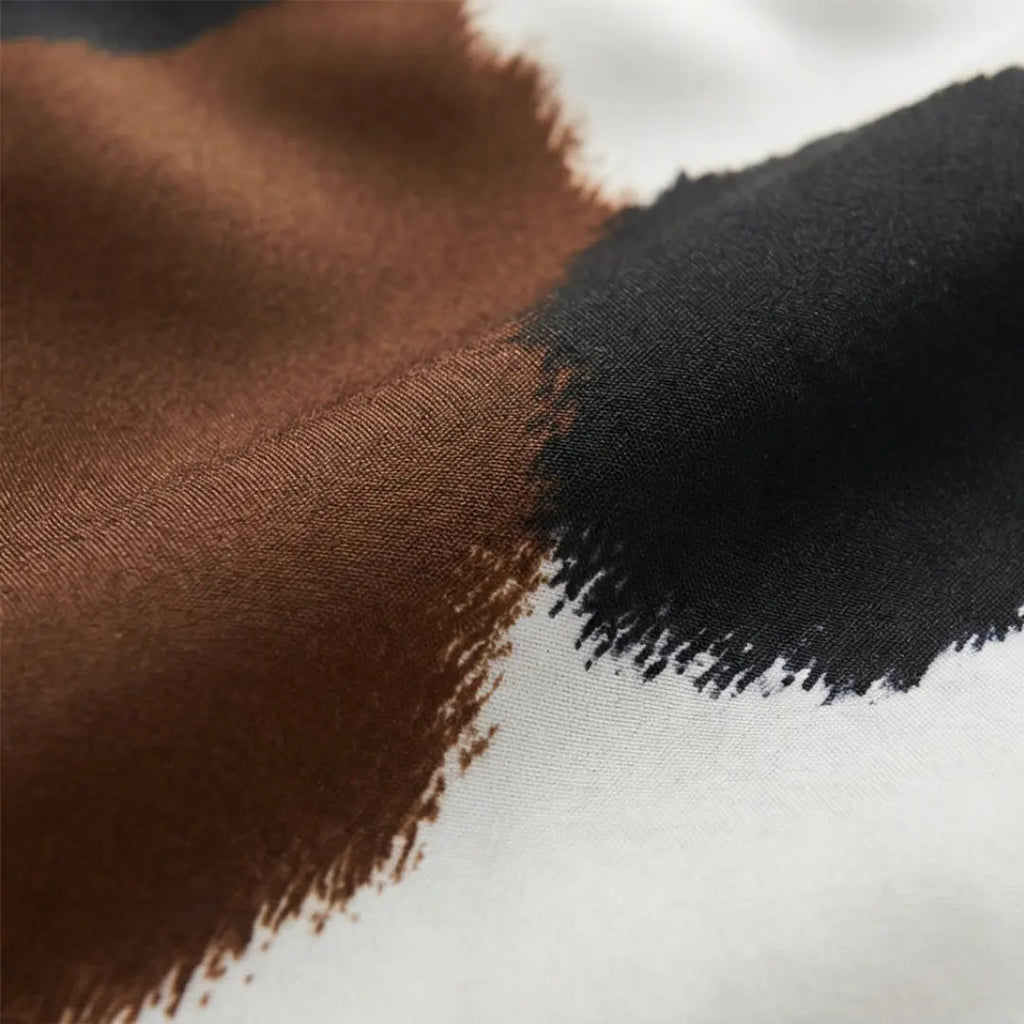 Påslakanset med koskinnsmönster, brun/svart/vit, polyester 90gsm