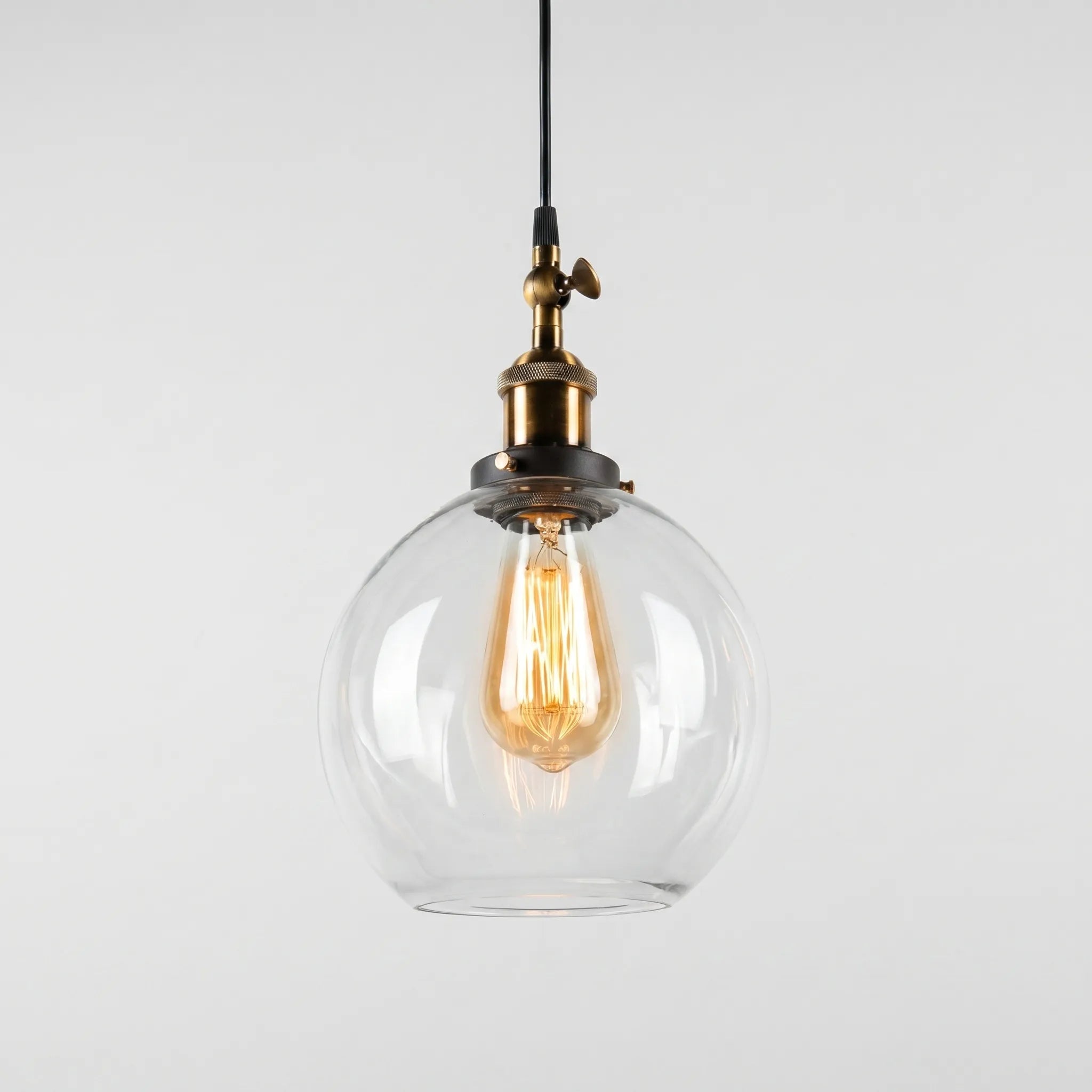 Vintage Spherical Pendant Light -  Illuminating Dining Spaces - Wildoxy