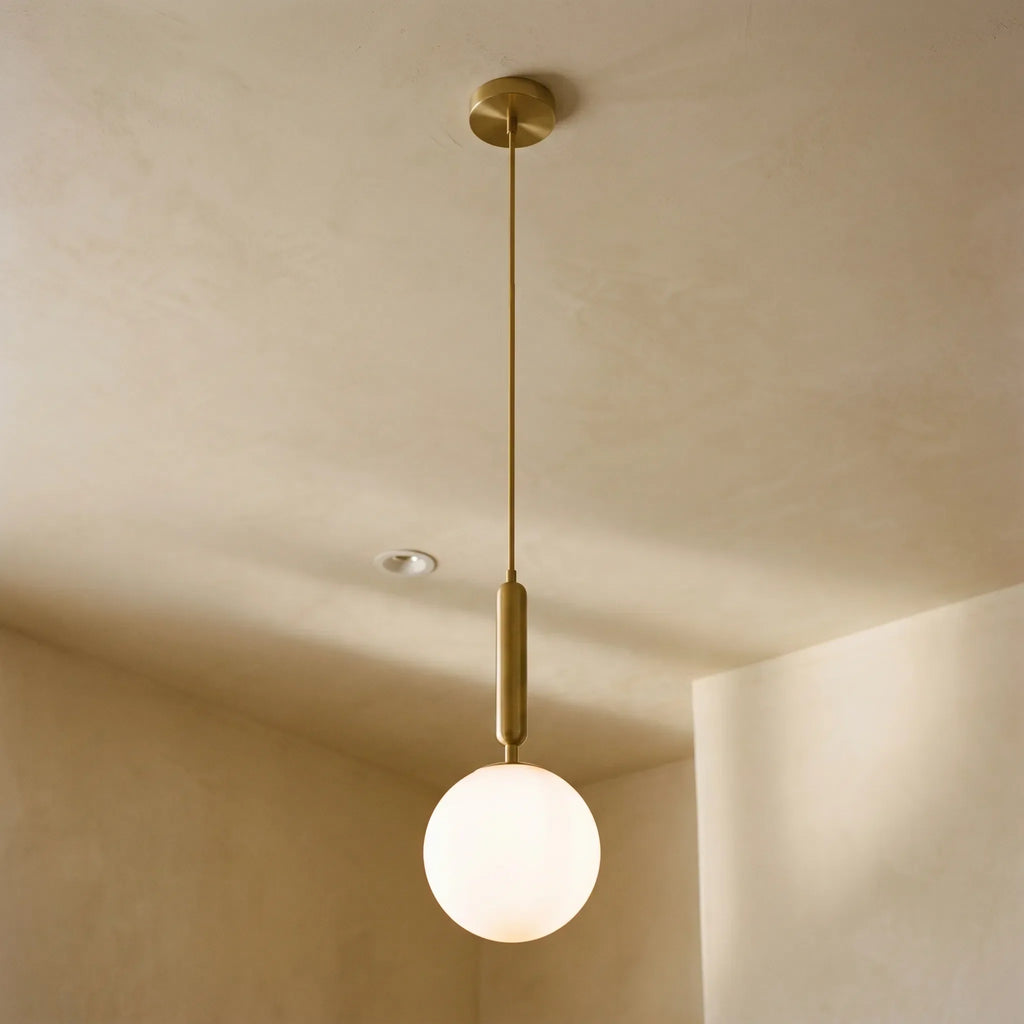 Minimalist Globe Pendant Light -  Illuminating Dining Spaces - Wildoxy