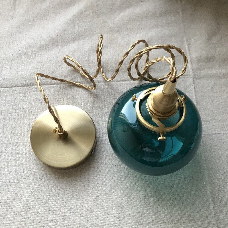 Liora Vintage Tones Glass Ball Pendant Light — Brushed Brass Fixture