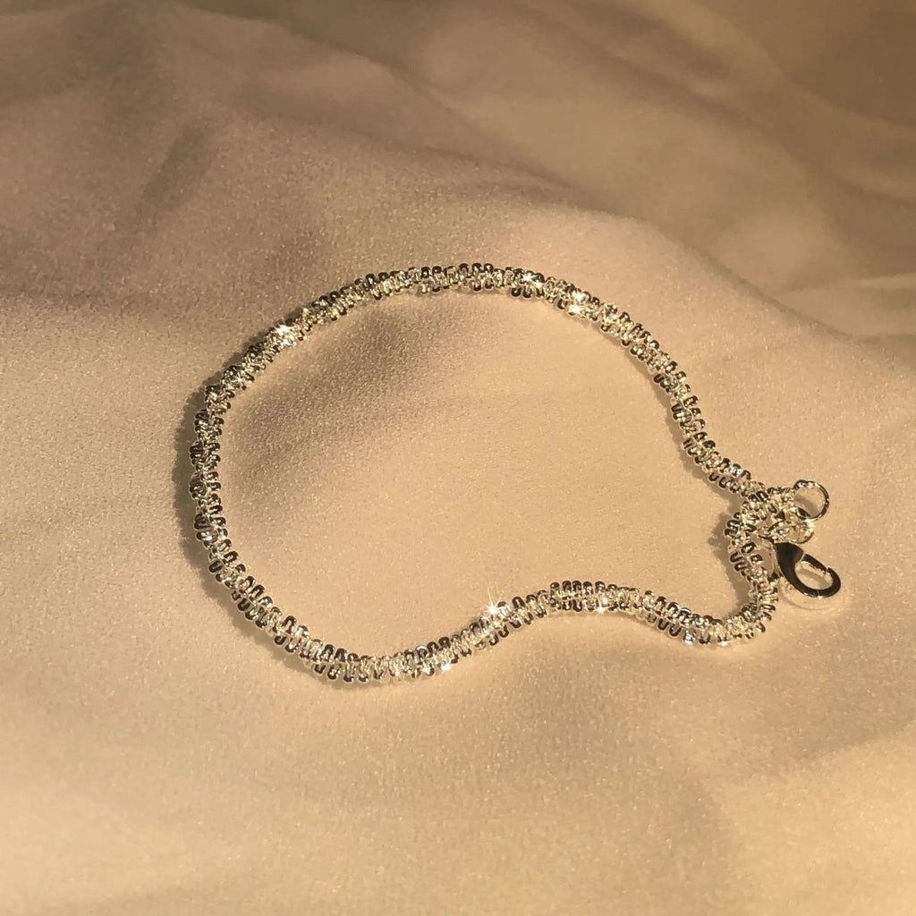 LumaBand Sterling Silver Bracelet — Minimalist Wrap Design, Subtle Sparkle