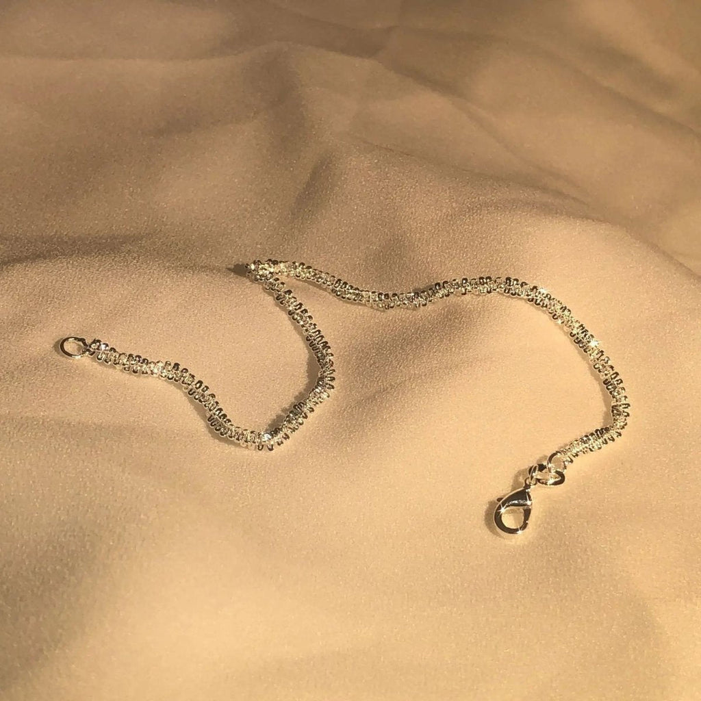 LumaBand Sterling Silver Bracelet — Minimalist Wrap Design, Subtle Sparkle