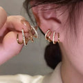 Gold-Silber-Ohrringe mit vier Krallen — Lagenlook mit Creolen