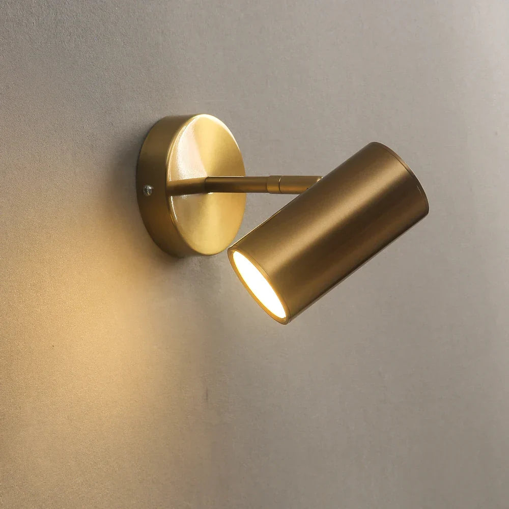 Foco de pared LED integrado giratorio, metal negro y dorado
