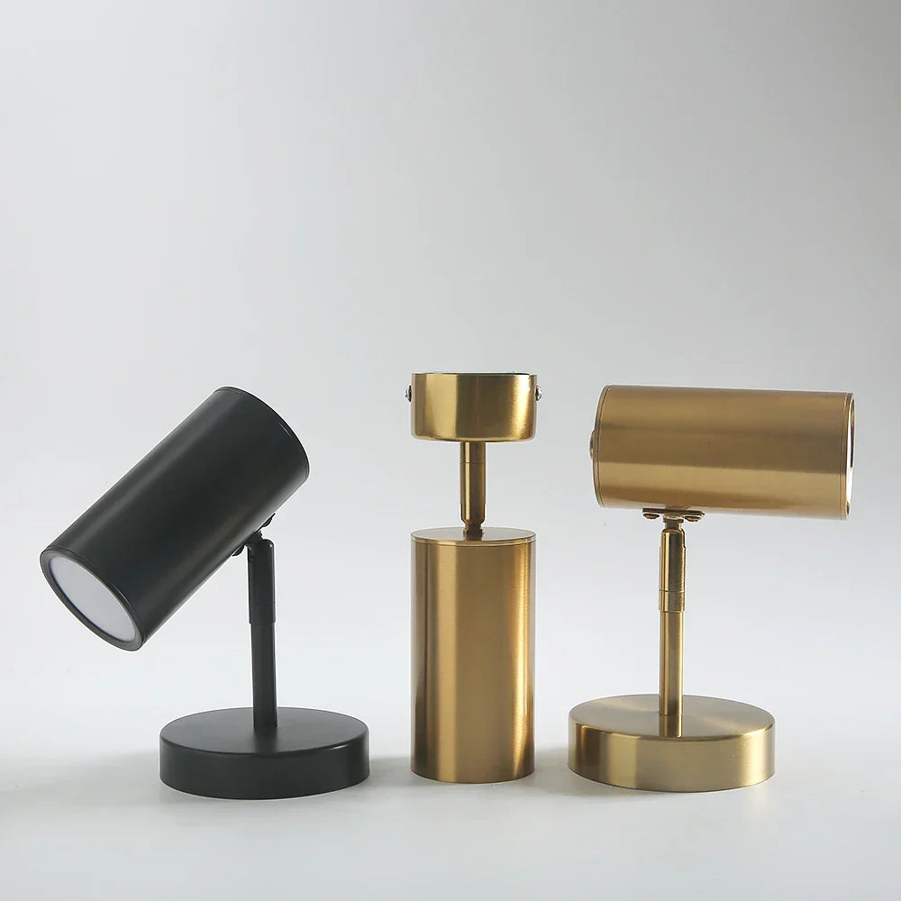 Foco de pared LED integrado giratorio, metal negro y dorado