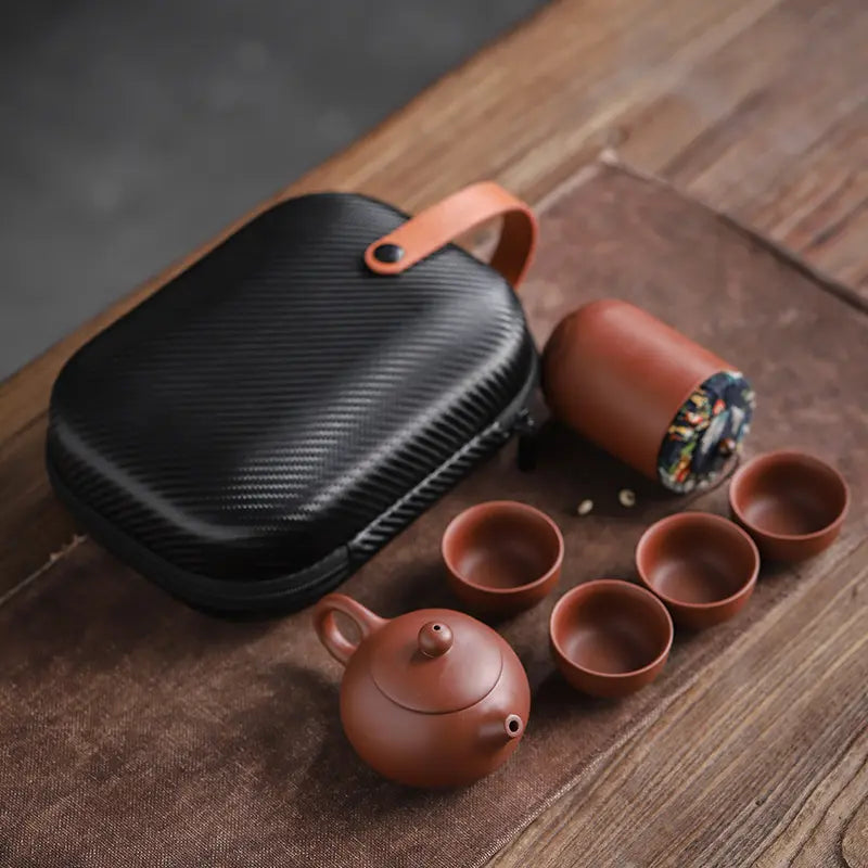 Juego de té de viaje de cerámica hecho a mano - tetera, 4 tazas y estuche