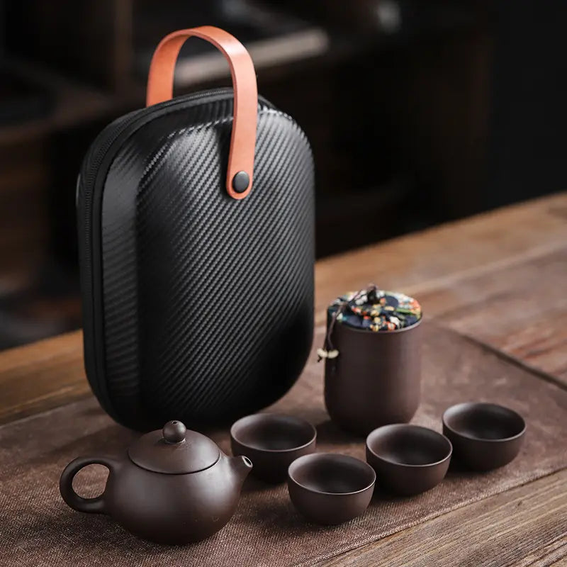 Juego de té de viaje de cerámica hecho a mano - tetera, 4 tazas y estuche