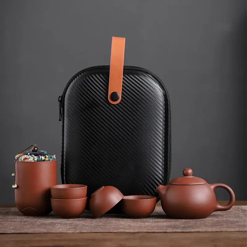 Juego de té de viaje de cerámica hecho a mano - tetera, 4 tazas y estuche