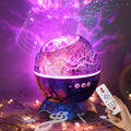 Luz nocturna con forma de huevo de dinosaurio — Proyector y altavoz Bluetooth