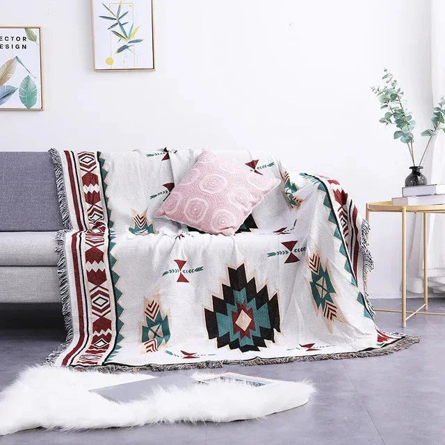 Värikäs jacquard-torkkupeitto — pehmeää puuvilla-polyesteriä, hapsut