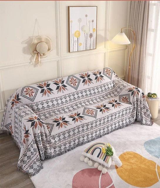 Värikäs jacquard-torkkupeitto — pehmeää puuvilla-polyesteriä, hapsut