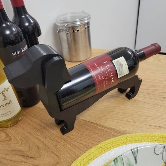 Botellero de resina con forma de perro salchicha, negro/gris/violeta/rojo/amarillo/azul