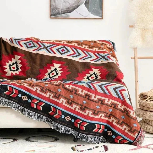 Värikäs jacquard-torkkupeitto — pehmeää puuvilla-polyesteriä, hapsut