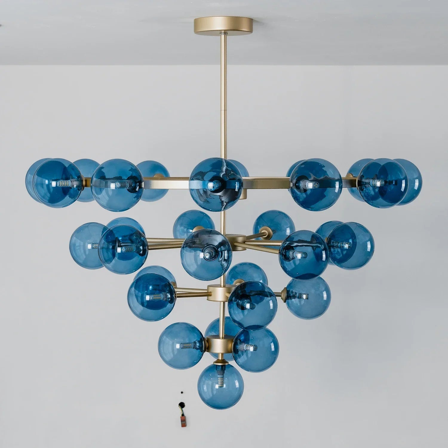 Cassian Blue Glass Globe Tiered Chandelier | wildoxy