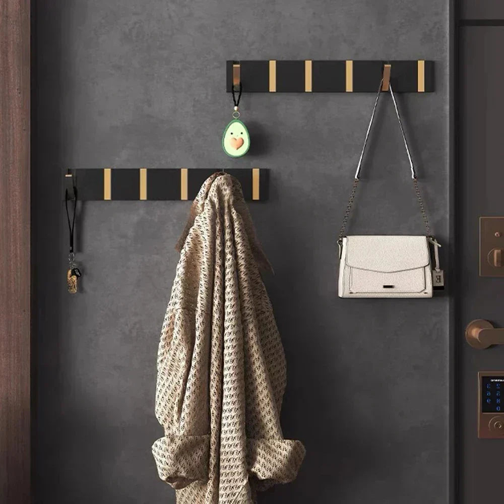 Luxusní skládací nástěnný háček — minimalistický prostorově úsporný design