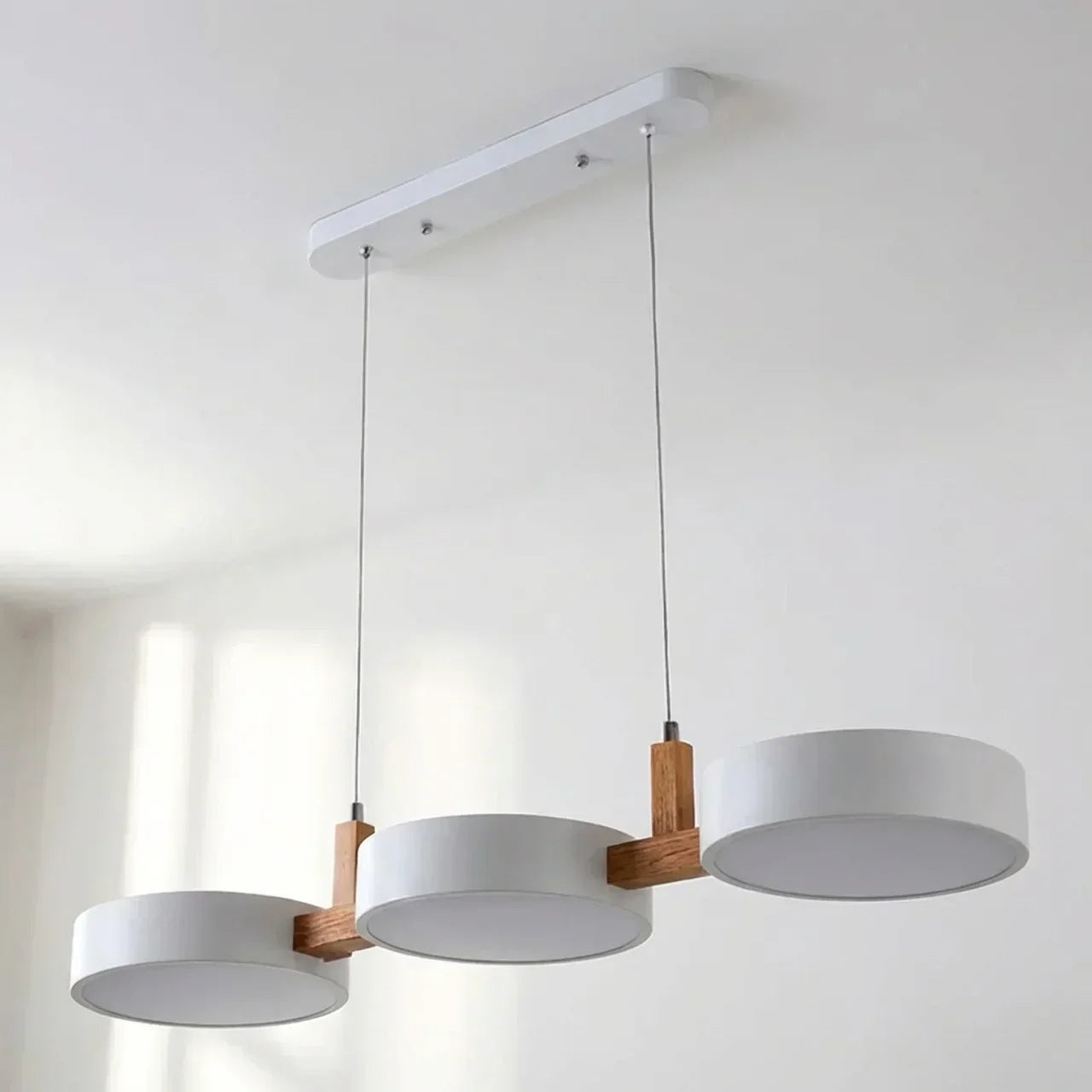Linear Solid Wood Beam Pendant — Staggered Metal Drum Shade Cluster