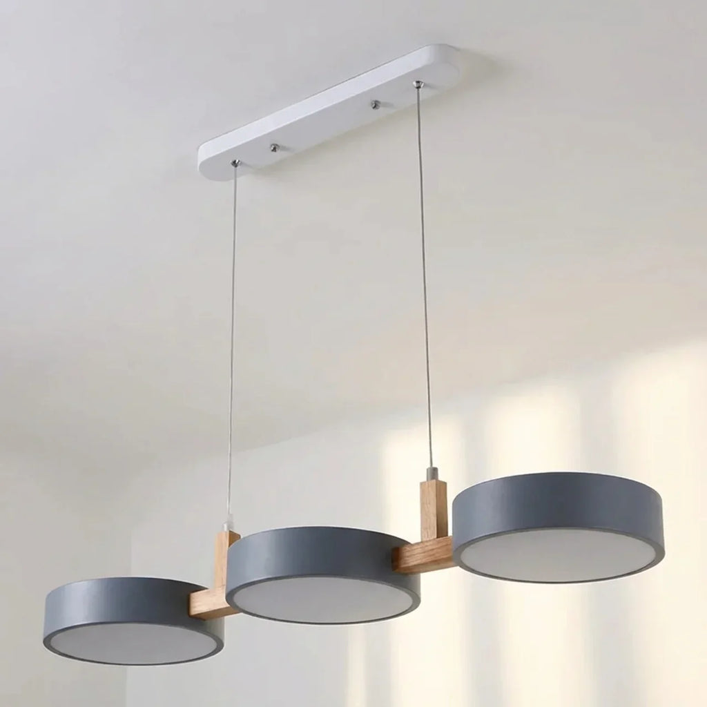 Linear Solid Wood Beam Pendant — Staggered Metal Drum Shade Cluster