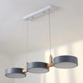 Linear Solid Wood Beam Pendant — Staggered Metal Drum Shade Cluster