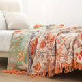 Baumwolldecke – Orange-blaue Boho-Blumen auf Creme, mit Fransen