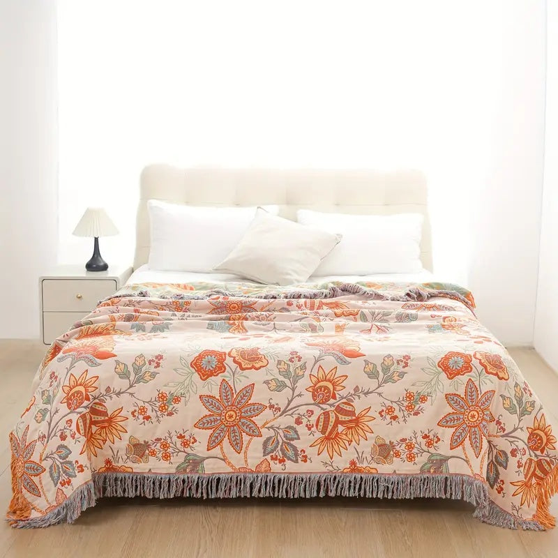 Baumwolldecke – Orange-blaue Boho-Blumen auf Creme, mit Fransen