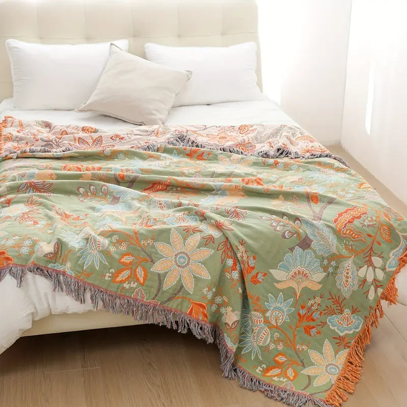 Baumwolldecke – Orange-blaue Boho-Blumen auf Creme, mit Fransen