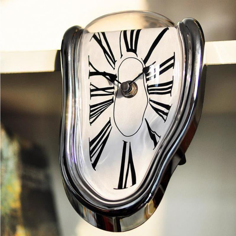 Horloge murale fondante style Salvador Dalí — noire, argentée et dorée